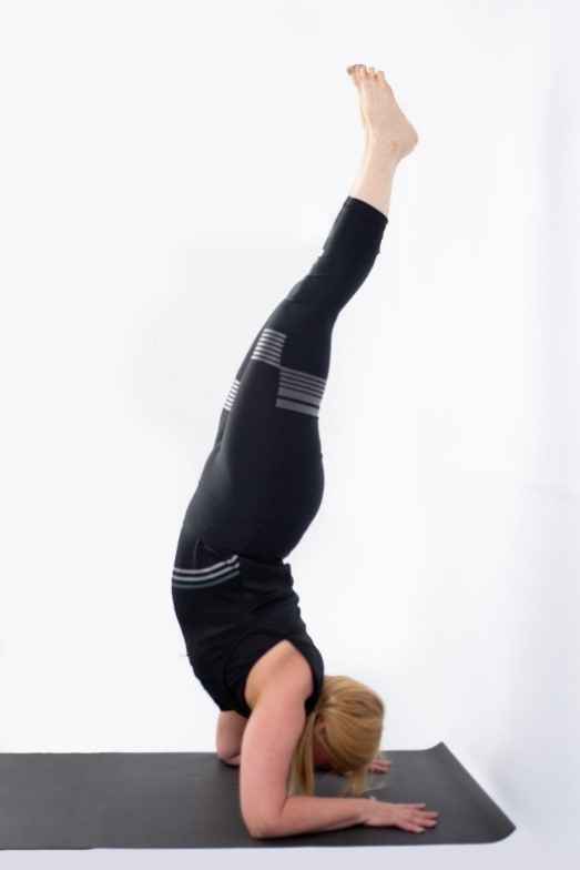 Feather Peacock Pose – Pincha Mayurasana